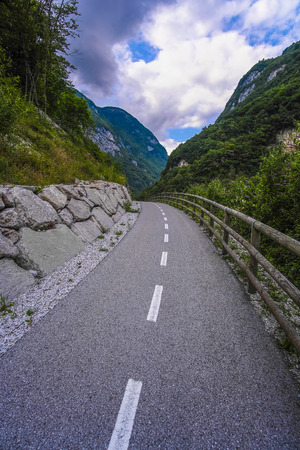 Alpine landscape with the image of roadの写真素材