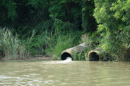 Sewage flows down to the river