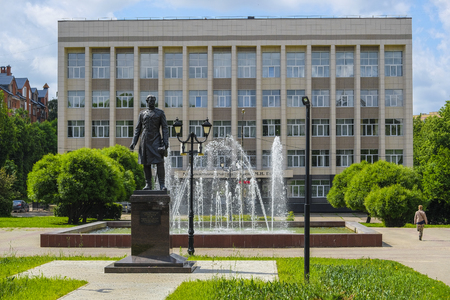 Smolensk, Russia - May, 26, 2019: the building of the music school named of  Glinka in Smolensk and a statue of Przhevalsky in front of himのeditorial素材
