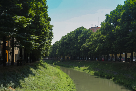 Padova, Italy - Jujy, 4, 2019: embankment of a channel in Padova, Italyのeditorial素材