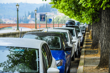 Verona, Italy - July, 28, 2019: cars parked on the street in Verona, Italyのeditorial素材