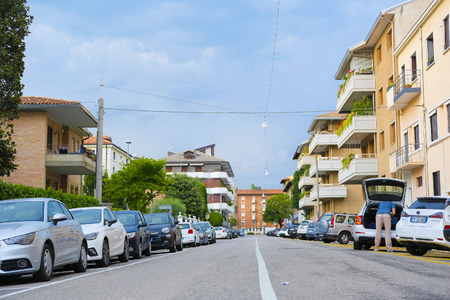 Rovigo, Italy - July, 7, 2019: cars parked on the street in Rovigo, Italyのeditorial素材