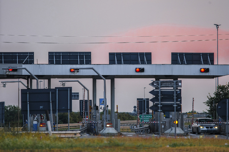 Rovigo, Italy - July, 26, 2019: highway toll station in Italy at sunsetのeditorial素材