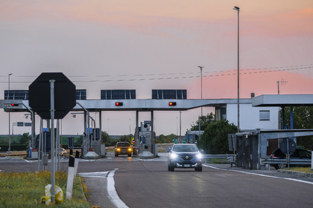 Rovigo, Italy - July, 26, 2019: highway toll station in Italy at sunsetのeditorial素材