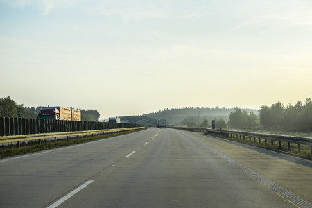 Warshaw, Poland - July, 26, 2019: landscape with the image of a road in Poland at sunsetのeditorial素材