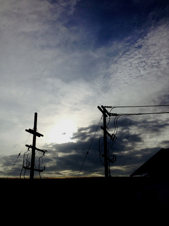 Silhouette electric wire  and postの写真素材