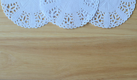 White Lace Paper On Wooden Board For Backgroundの写真素材