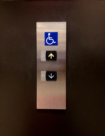 Disabled elevator push buttonの写真素材