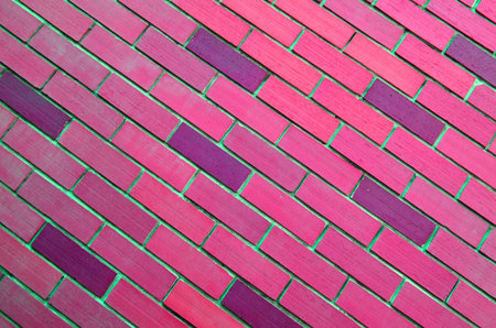 Oblique pink mansory brick wall background