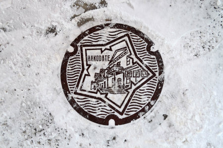 Drain cover with snow on the floor - Hakodate,  Japan