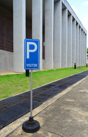Blue and white visitor parking signの写真素材