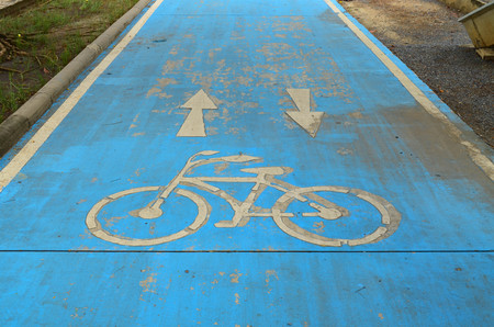 White bicycle sign on blue grunge lane - sport and healthy lifestyle conceptの写真素材