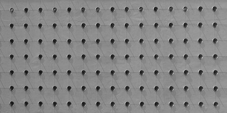 Abstract facade of modern building with circle hole, gray colorの写真素材
