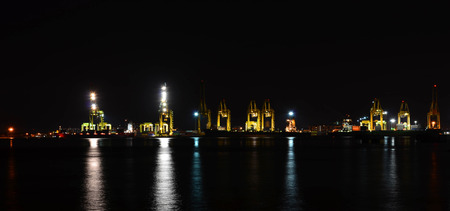Night panorama view of seaport container cargo freight industrialの写真素材