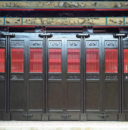 Oriental Chinese wooden door with traditional patternの写真素材