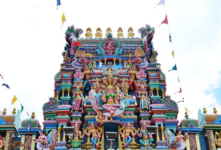 Hindu god statue on the facade of Hindu temple, Penang,  Malaysia