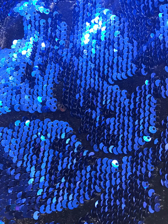 Sparkling blue sequin textile background
