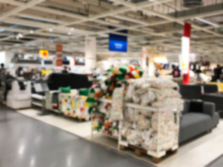 Abstract blurred furniture store and shopping mall interior backgroundの写真素材
