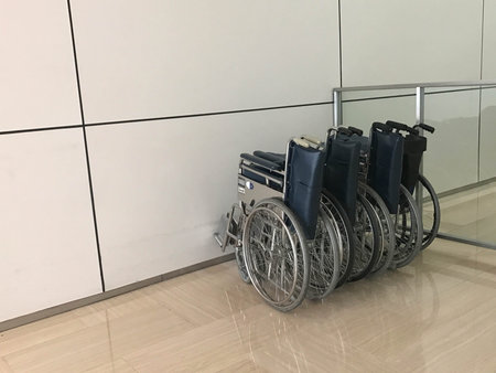 Empty wheelchair for disabled or elder or patient in department storeの写真素材