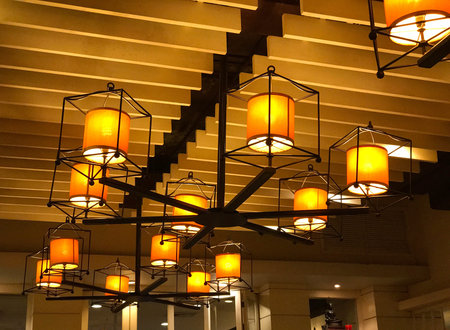 Hanging lamp and light bulb in hotel or restaurantの写真素材