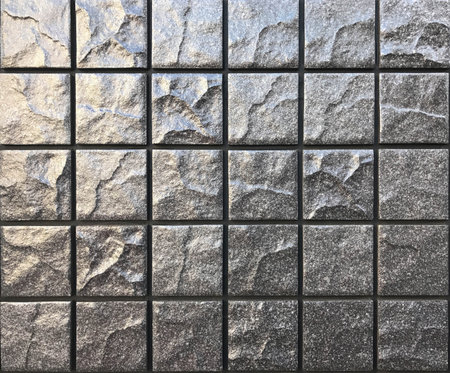Black ceramic tile wall for background