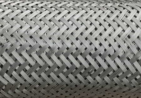 Stainless woven wire tube, background and texture
