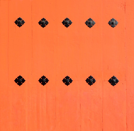 Japanese architecture - orange temple wooden doorの写真素材