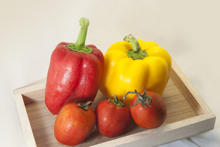 Fresh red and yellow sweet pepper with tomatoes. studio shooting.のeditorial素材