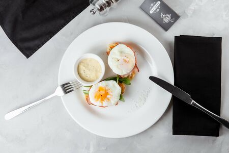 Sandwich with egg tomato and bacon. A delicious breakfast.の写真素材