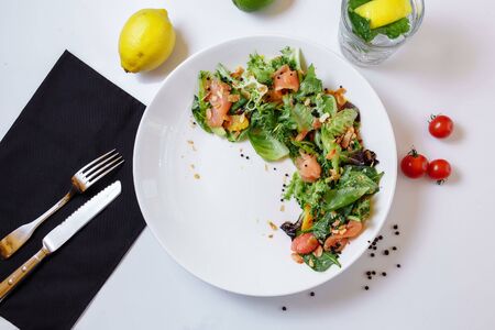 Summer light salad with fresh salmon. Light breakfast lunch for the summer with salted red fish.の写真素材