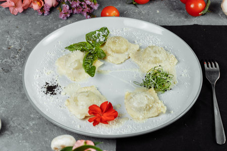 pasta ravioli with meat, tomato and basilの写真素材