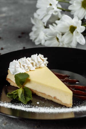 Dessert - Cheesecake with Berries Sauce and Green Mint.の写真素材