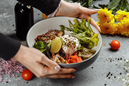 Healthy bowl - quinoa salad with tuna, broccoli, avocado on wooden rustic table. top view.の写真素材