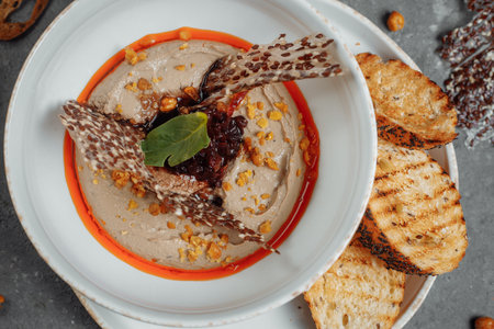 Mushroom cream soup on dark background. Champignon soupの写真素材