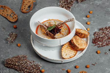 Mushroom cream soup on dark background. Champignon soupの写真素材