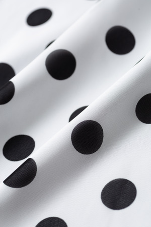 Black dot pattern white clothの写真素材