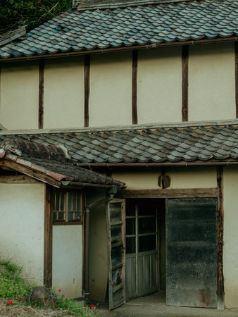 Old wooden door and window of an old house in the countryside of Okayama, Japanの写真素材