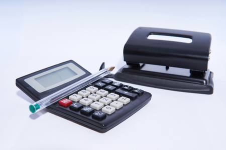 office accessories calculator pen and puncherの写真素材