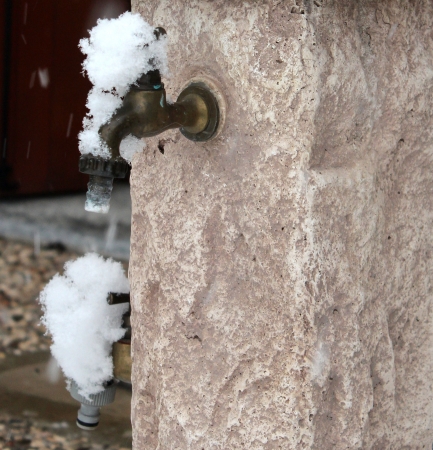 fountain under the snowの写真素材