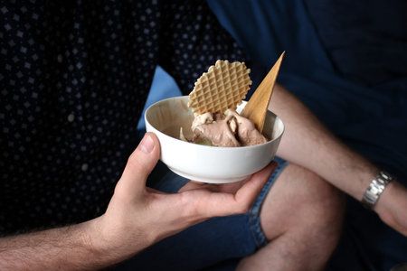 cup of mixed ice cream with biscuits