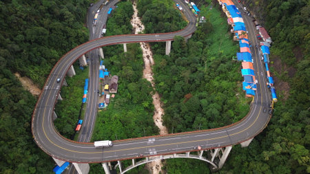 Aerial view of highway road in the forest,Thailand.の写真素材