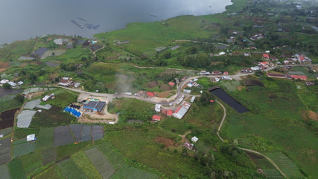 aerial view of the village in the middle of the rainforestの写真素材