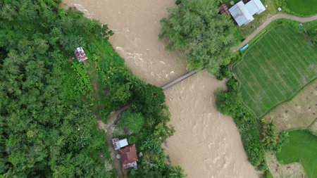 Aerial view of a river flowing through the forest in Thailand.の写真素材