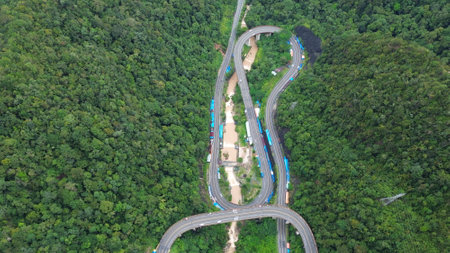 Aerial view of highway road in the forest. Top view.の写真素材