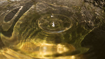 Blurred water droplets. Pure water. With a background of waterの写真素材