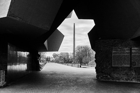 Brest, Belarus - December 28, 2016: The Main Entrance with carved five-pointed star to War Memorial Complex Brest-Hero-Fortress , black-white.のeditorial素材