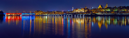 Warsaw, Poland - March 21, 2017: Great panoramic night view of the center and the Old City of Warsaw - Stare Miasto - from the right bank of the Vistula River.のeditorial素材