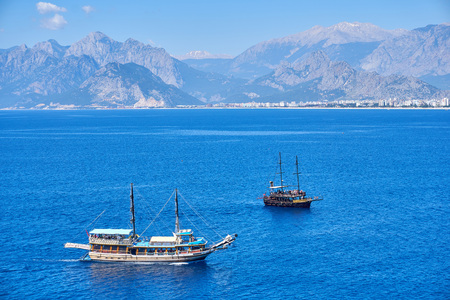 ANTALYA, TURKEY - MAY 21, 2017: Panoramic view on Old marina - most popular tourist place, cozy cafes, luxury restaurants, green park and landmarks in Antalya, Turkey.のeditorial素材