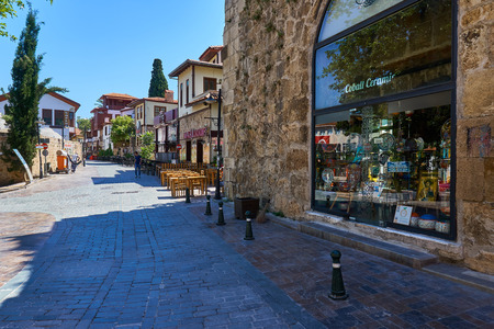 ANTALYA, TURKEY - MAY 21, 2017: Old street view in the Historic part of Antalya, Turkey. Old town of Antalya is a popular destination: The unique atmosphere of the old city attracts tourists from all over the world.のeditorial素材