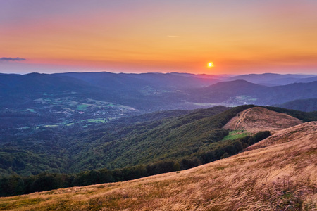 Sunset. Beautiful panoramic view of the Bieszczady Mountains in the early autumn, Bieszczady National Park, Poland.の写真素材
